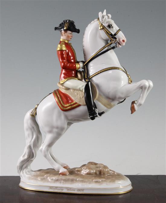 An Augarten Austria Spanish Riding School group, modelled by Dobrich, 28cm, loss to ear